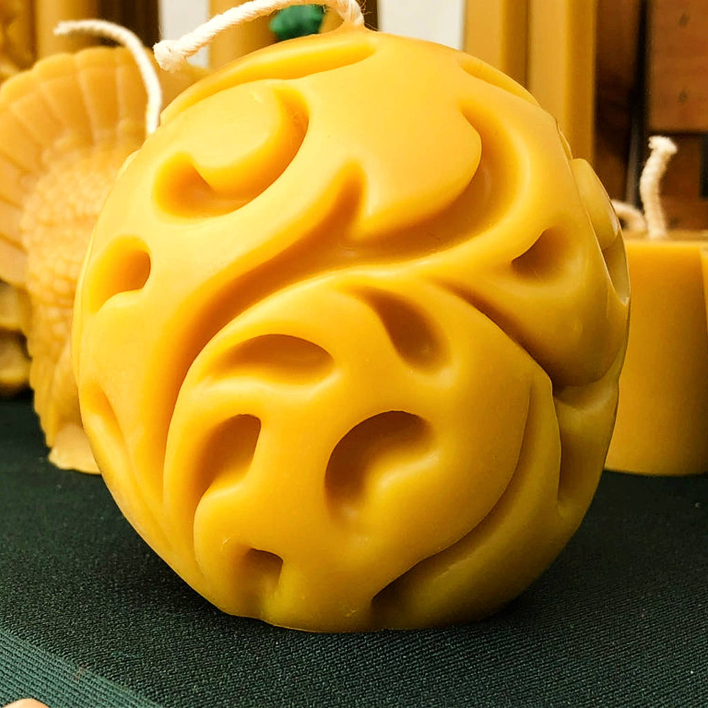 Decorative candle with fine detail from Mill Creek Apiary.  All of our candles are handmade with 100% pure beeswax. 