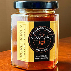 8 ounce jar of wildflower honey from Mill Creek Apiary